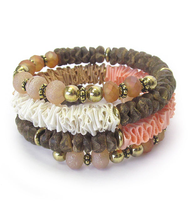 Multi wood bead and fabric mix coil bracelet